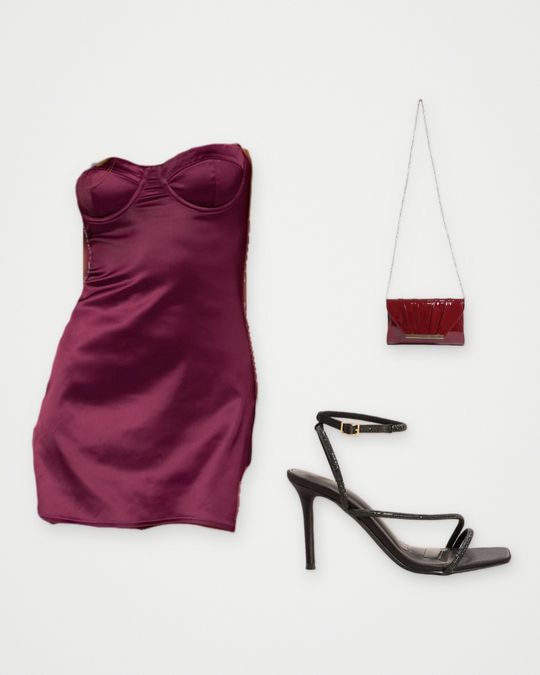 Outfit board: A burgundy satin bustier mini dress, a red croc clutch and black strappy heels